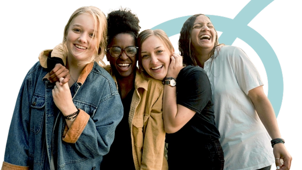 Four adults laughing together